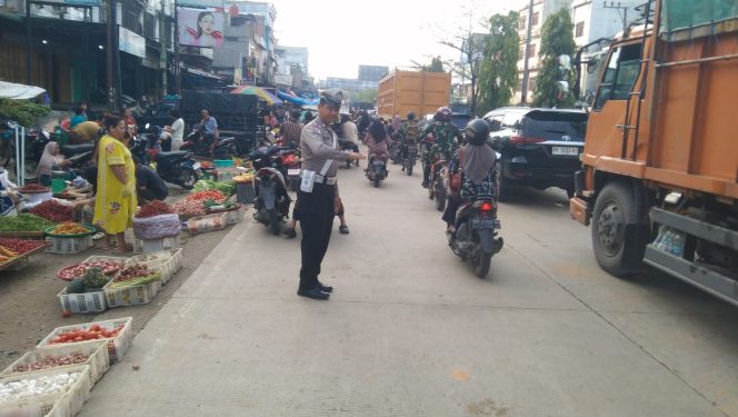 
					Laksanakan Strong Point Pagi, Polsek Bagan Sinembah Atur Arus Lalu Lintas